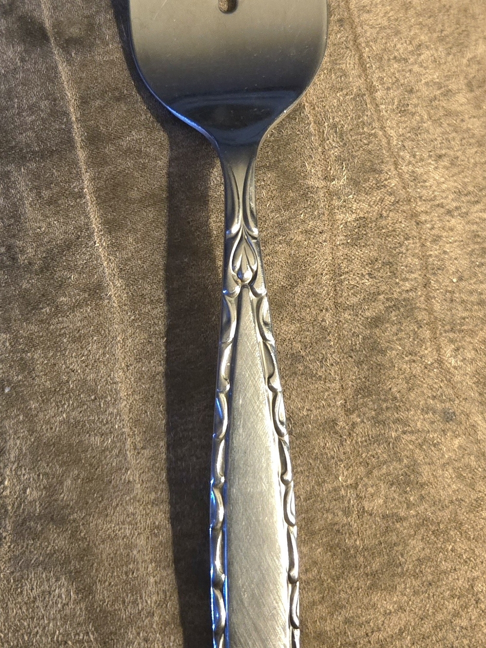 Oneida Silver Decorative Serving Spoon with Scroll Handle